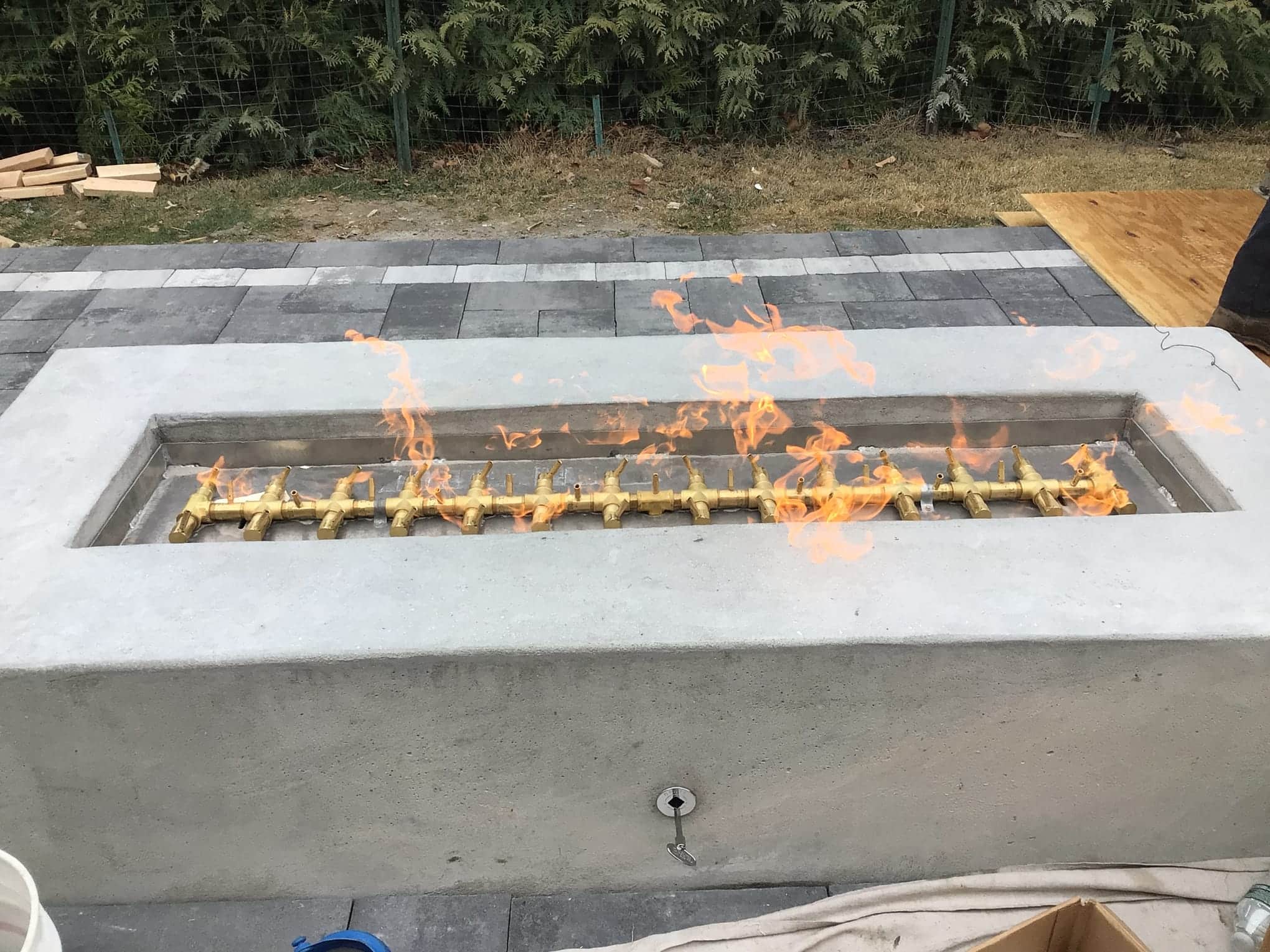 Finished fire pit installation outside on the patio in Rockville Centre, NY