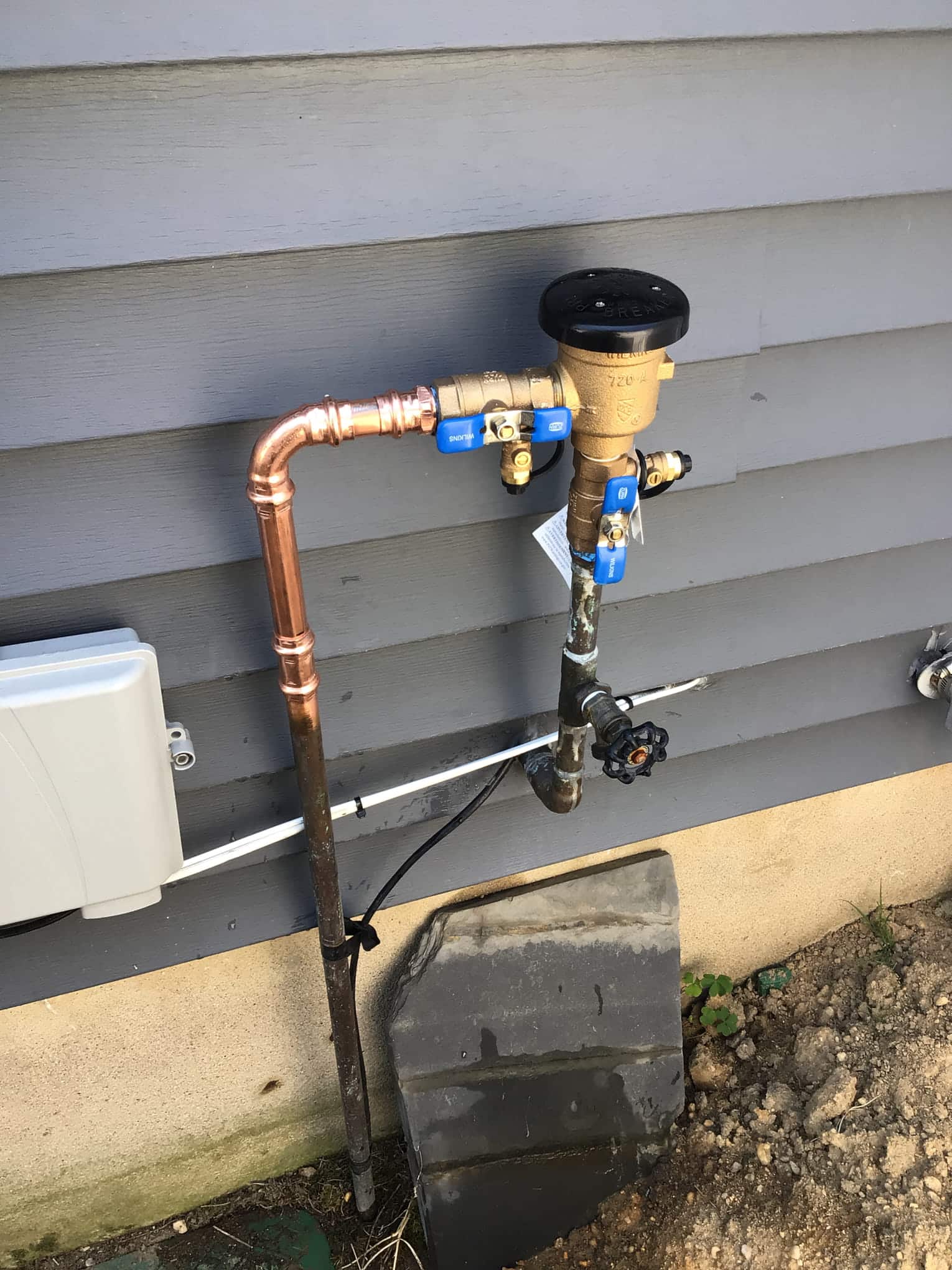 Piping on the outside of the house after Pride Services in Rockville Centre, NY