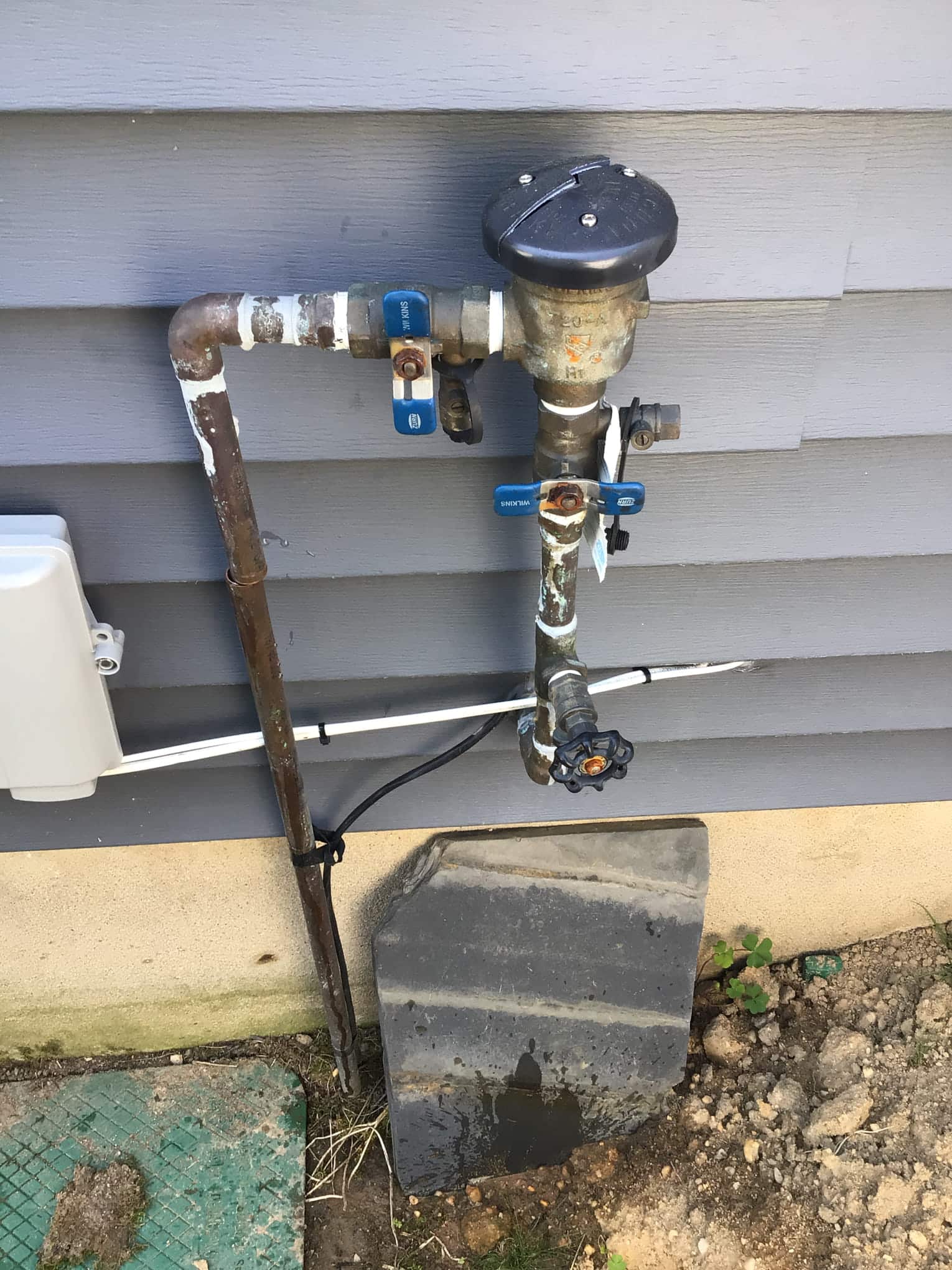 Piping on the outside of the house before Pride Services In Rockville Centre, NY