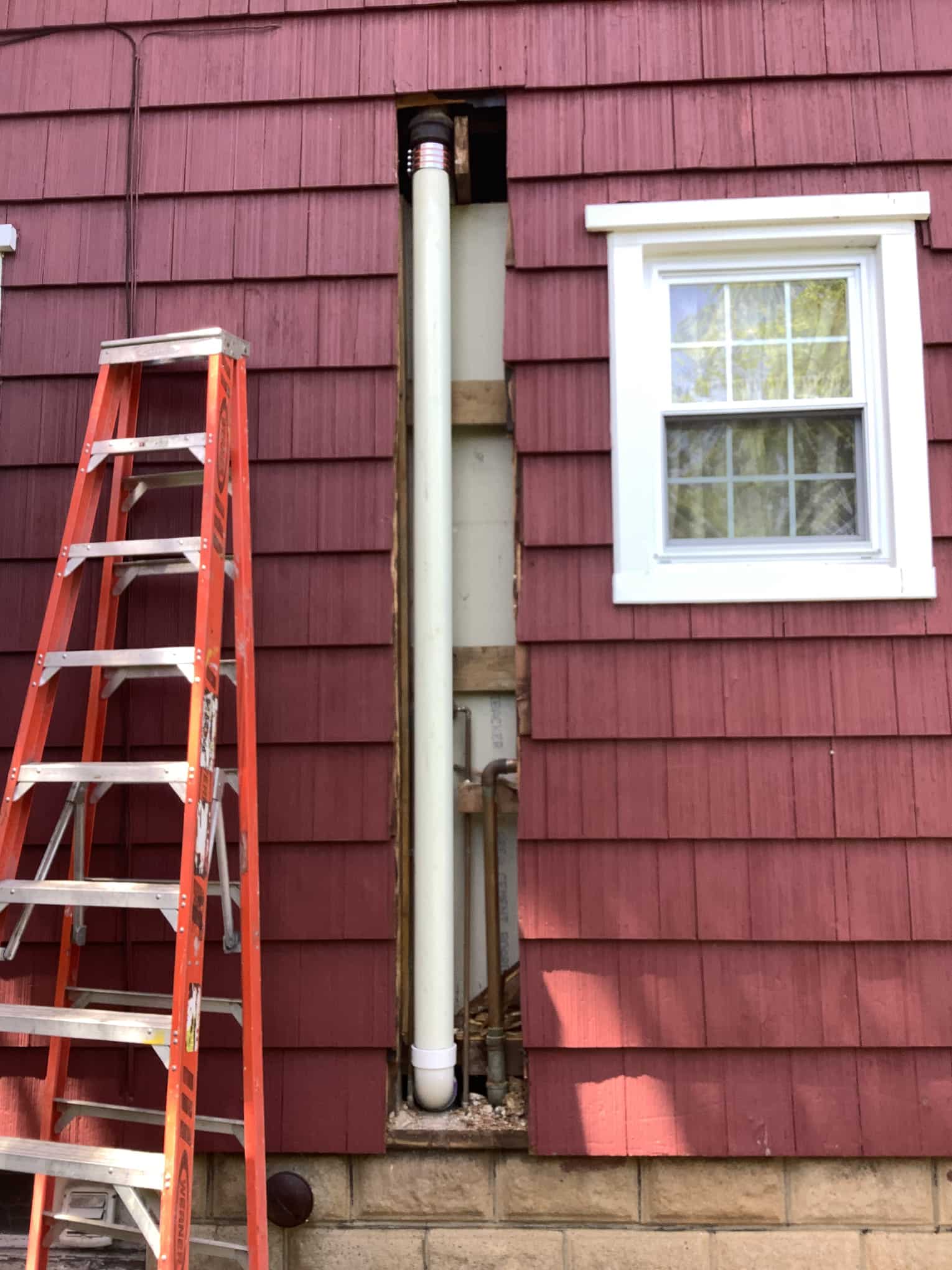 Piping installation on the outside of a house in Rockville Centre, NY