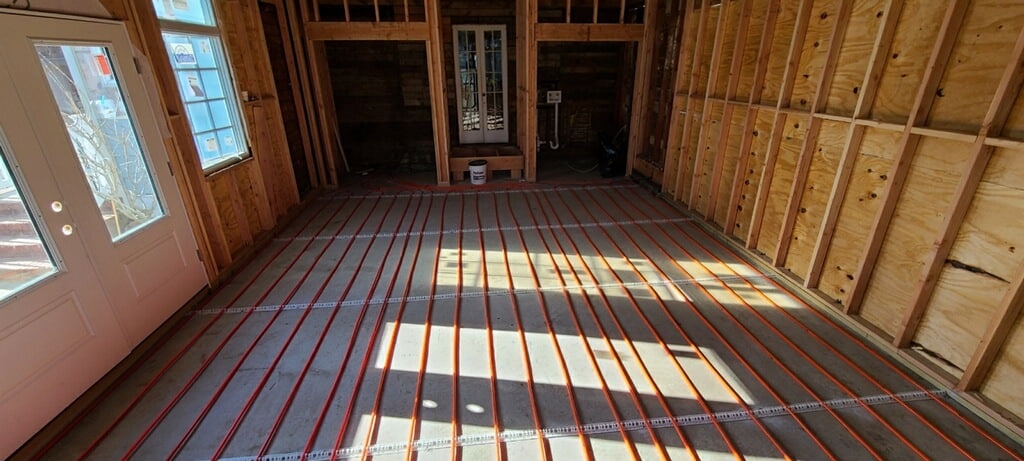 Radiant heat installed across the bottom of a room floor in Rockville Centre, NY