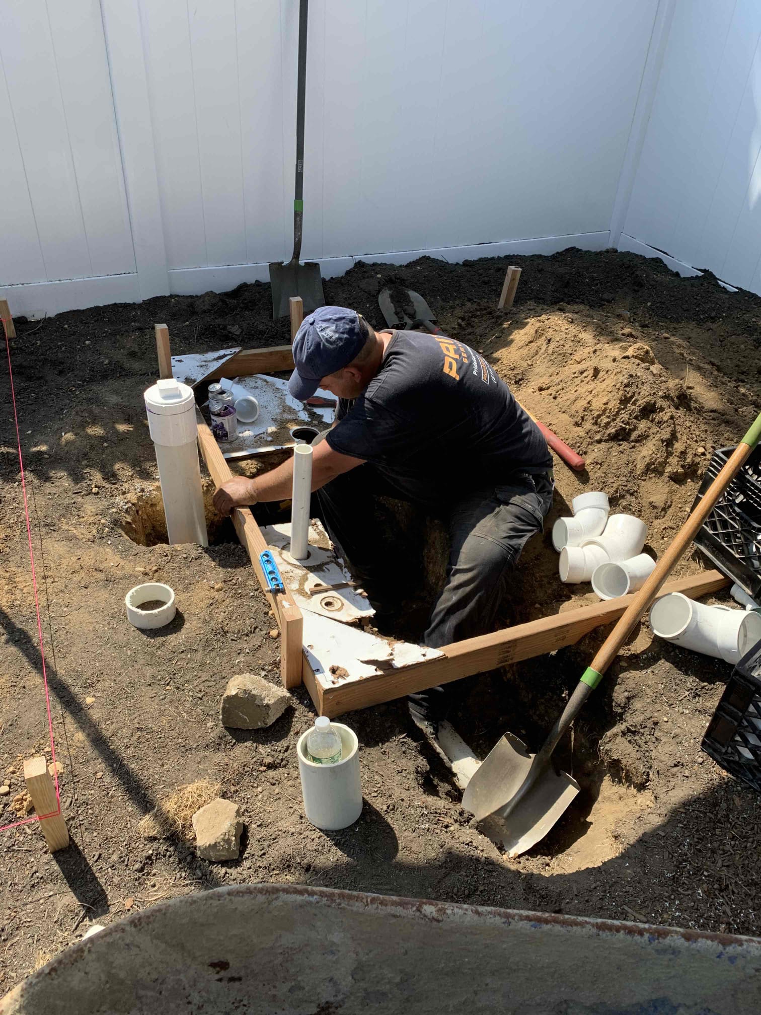 Pride Services technician working outside on pipping in Rockville Centre, NY