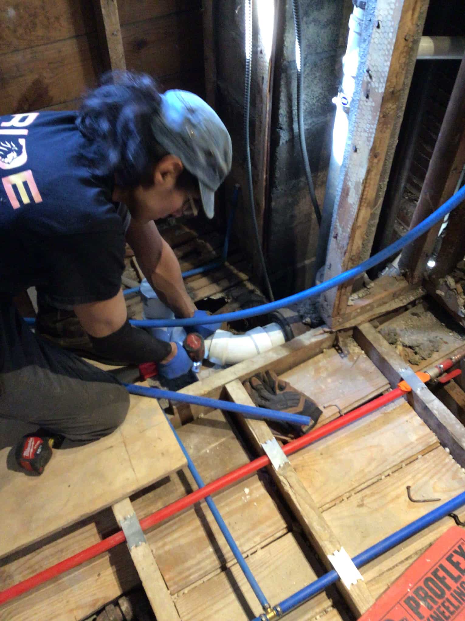 Pride Services technician working on piping in Rockville Centre, NY