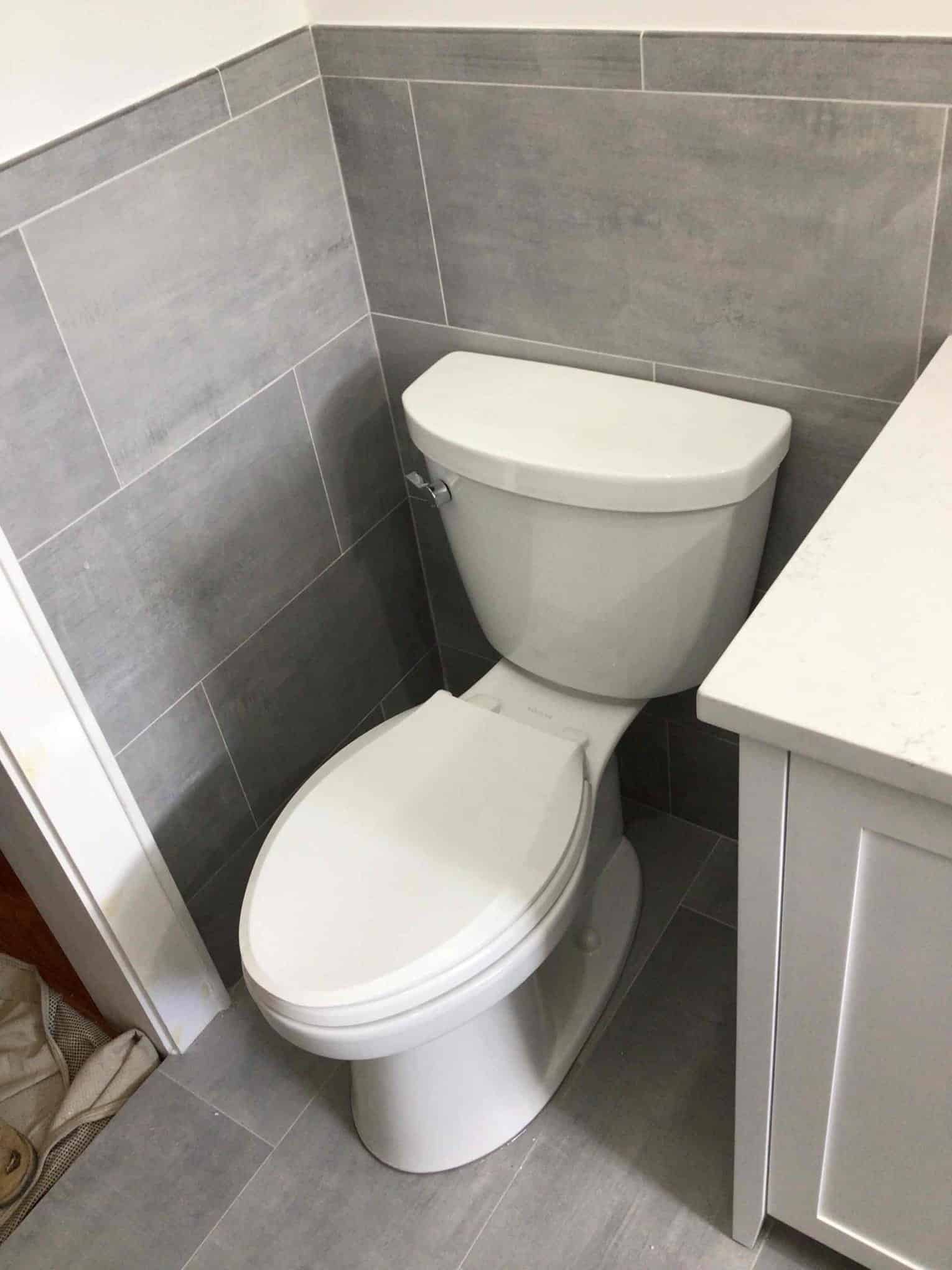 Finished toilet installation in bathroom in Rockville Centre, NY