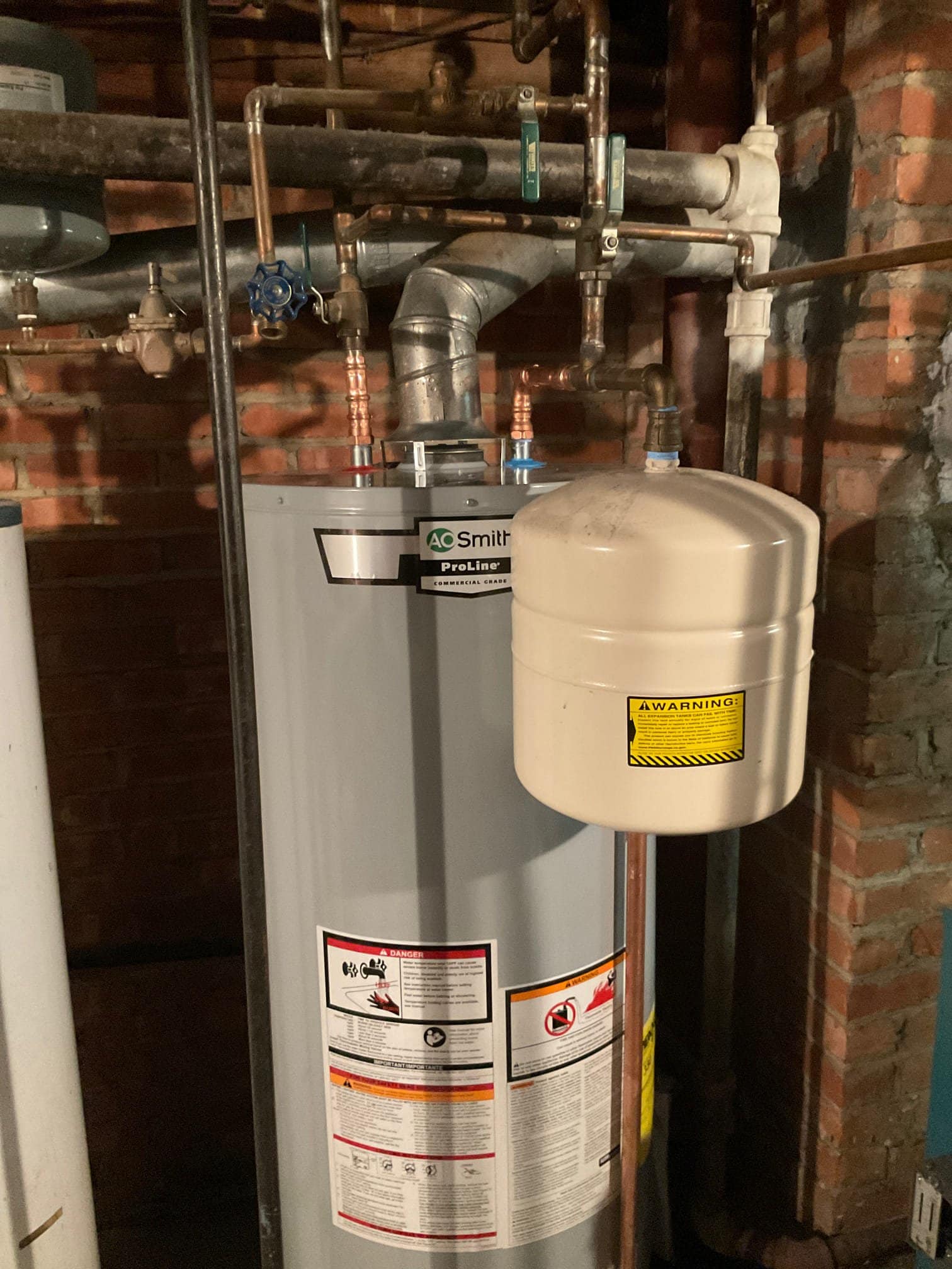 Water heater installed in basement with expansion tank in Rockville Centre, NY