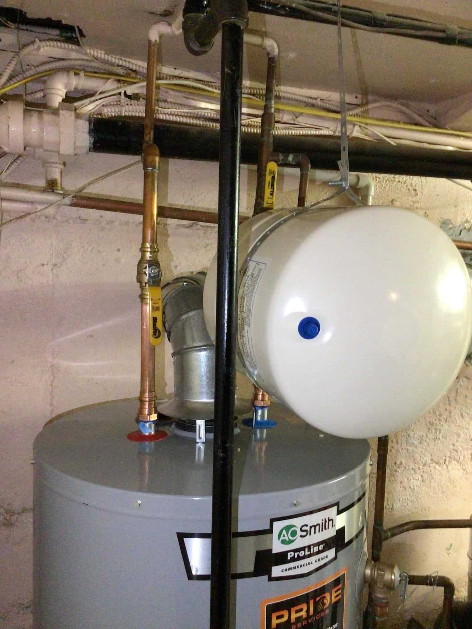 Water heater installed in basement with expansion tank in Rockville Centre, NY