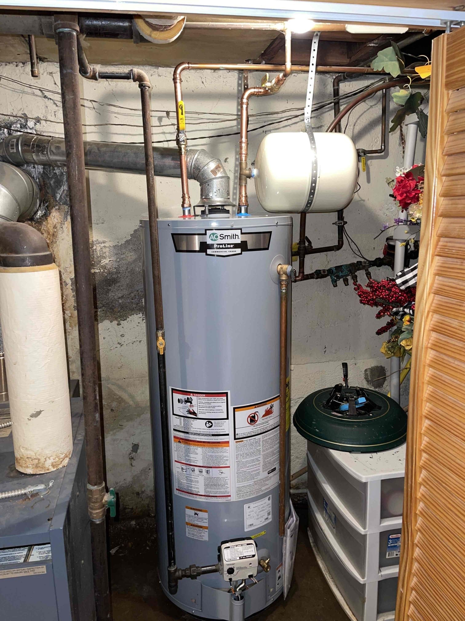 Water heater installed in basement with expansion tank in Rockville Centre, NY