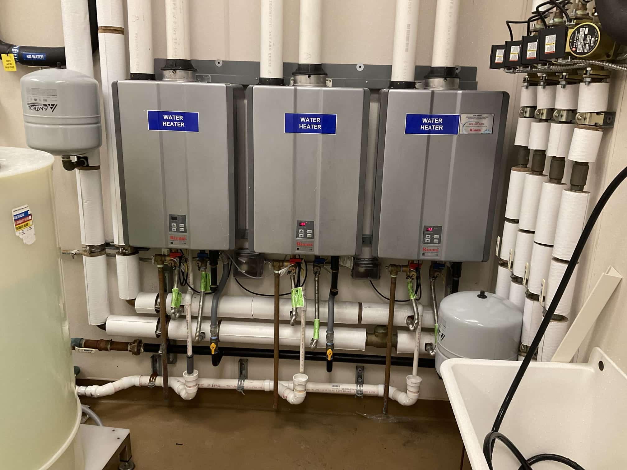 Water heater's installed in basement before pride services in Rockville Centre, NY